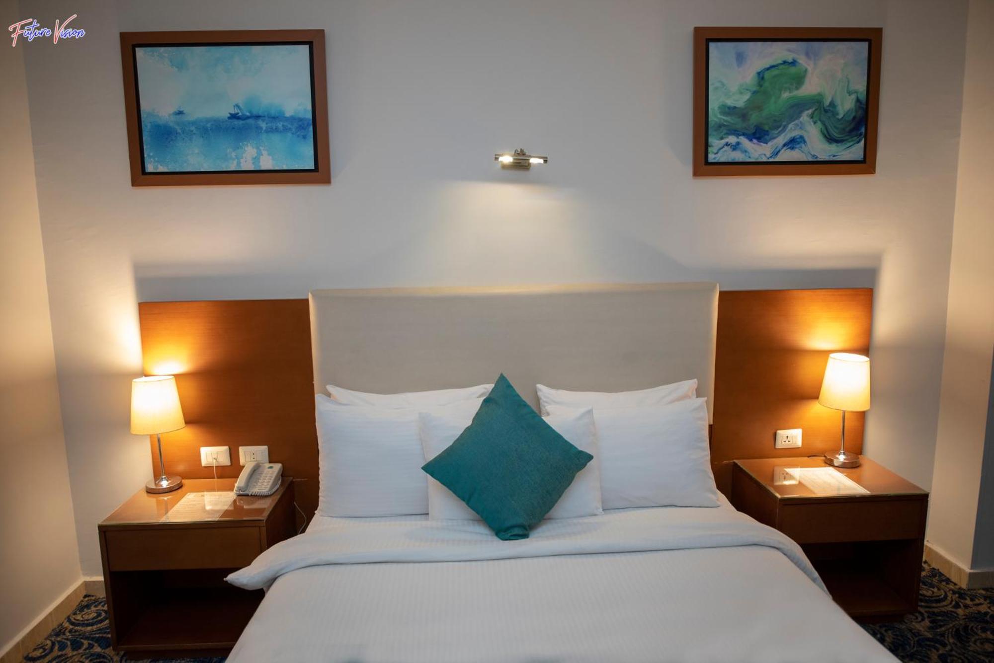 Rehana Plaza Hotel Cairo Exterior photo A bedroom at the hotel